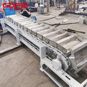 앞치마 계량 공급 장치